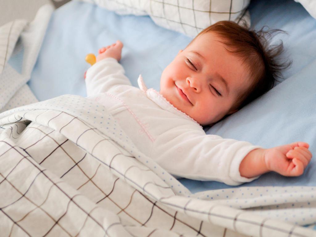 Поза для сна новорожденного после кормления