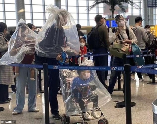 One picture shows a family, including a mother carrying her baby in a harness, wearing plastic bags in an airport